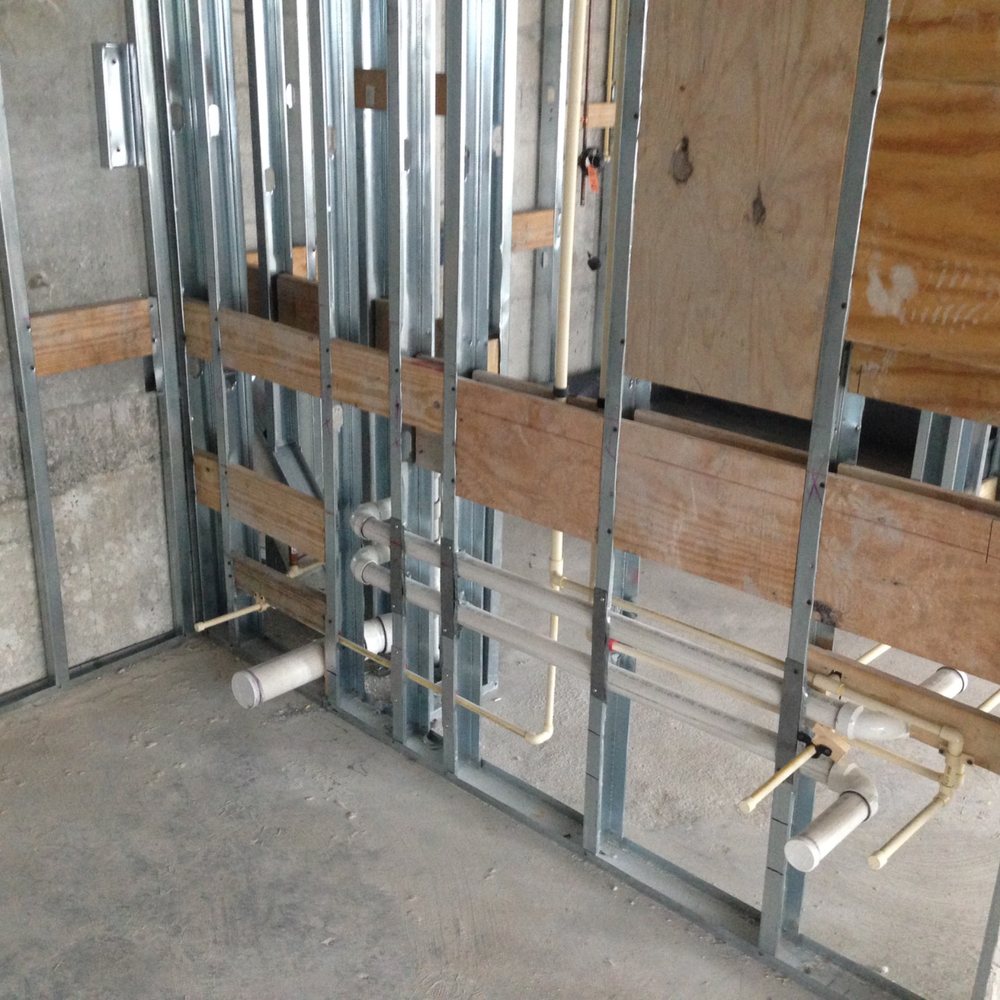 Metal stud framing and plumbing